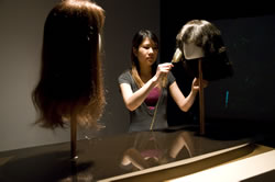 <em>Formants</em> (2008). Fiberglass, plexiglass, hair, copper, wood, custom electronics (20" x 49" x 27.5"). Exhibited as part of<em> Trivial Pursuits: Mass Distraction</em> curated by Jennifer Chan at Interaccess Electronic Media Arts Centre, Toronto, 10 July – 15 August 2009. Image courtesy of Interaccess Electronic Media Arts Centre.